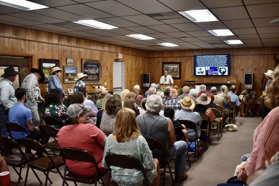 Brett Cruse speaks to a packed museum.