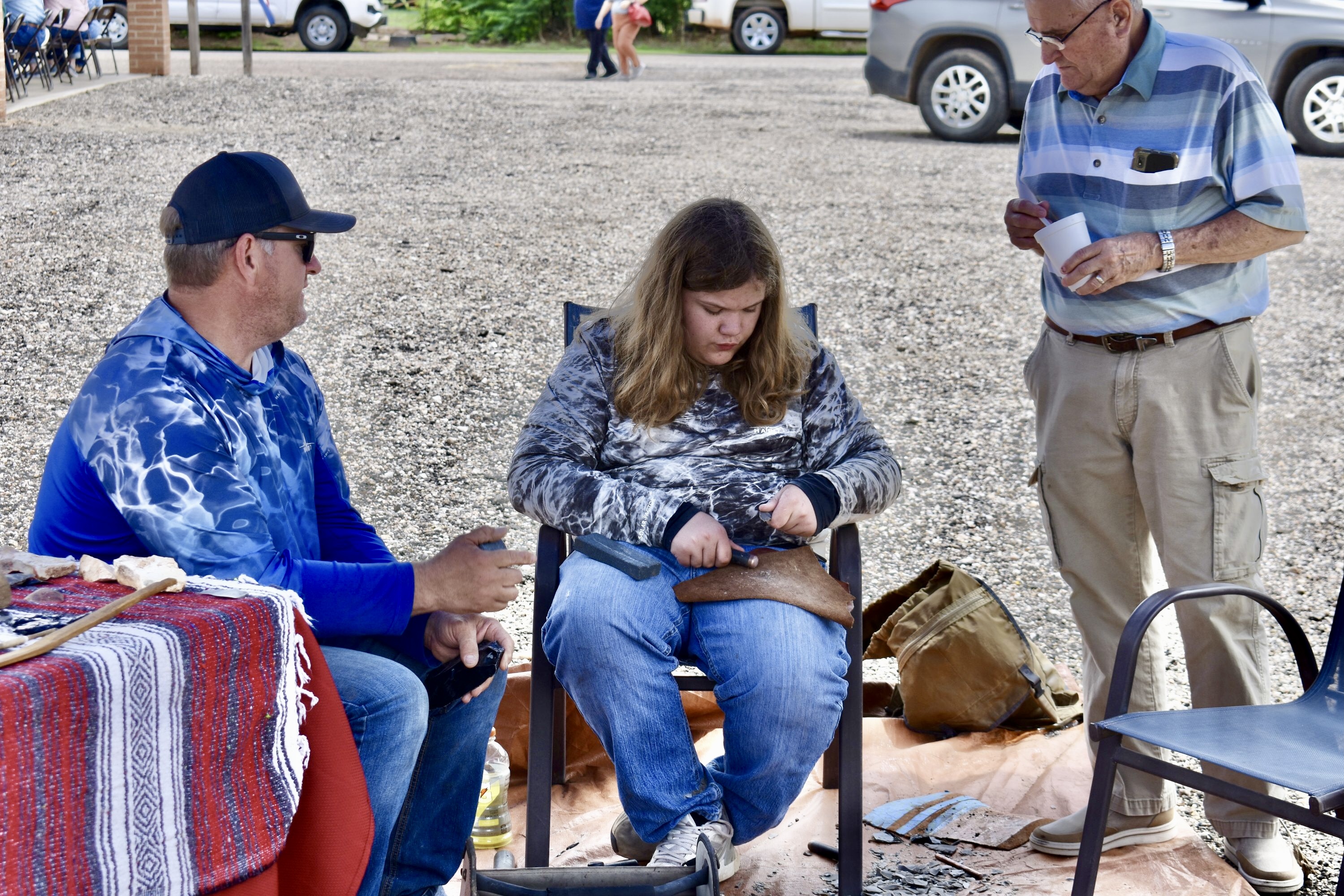 Todd (left) and Sam Montandon (right), an impressive young flintknapper. (Photo by Kayla White)